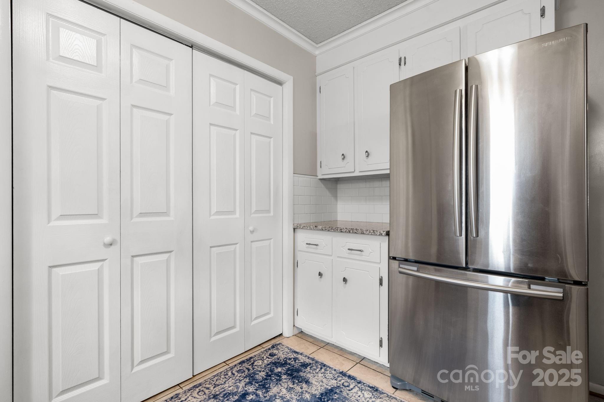 1553 Castell Lane Hickory, NC 28601 - Photo 10 of 27 a kitchen with cabinets and stainless steel appliances