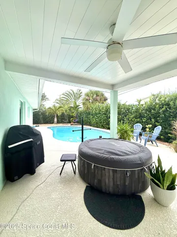 a room with a bed and a view of balcony