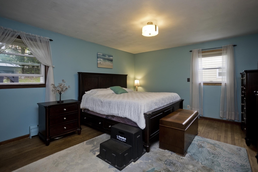 87 Benz Street Springfield, MA 01118 - Photo 21 of 30 a bedroom with a bed and a closet