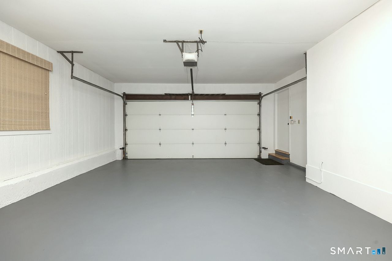 185 Nepas Road Fairfield, CT 06825 - Photo 29 of 38 Newly painted floors and panelled walls. This can be used as your two car garage or your next gym....you decide!