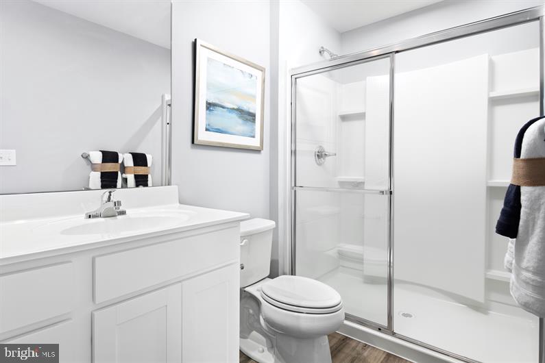 9216 Cooks Point Court, Unit 34 Lanham, MD 20706 - Photo 12 of 17 a bathroom with a sink toilet and shower