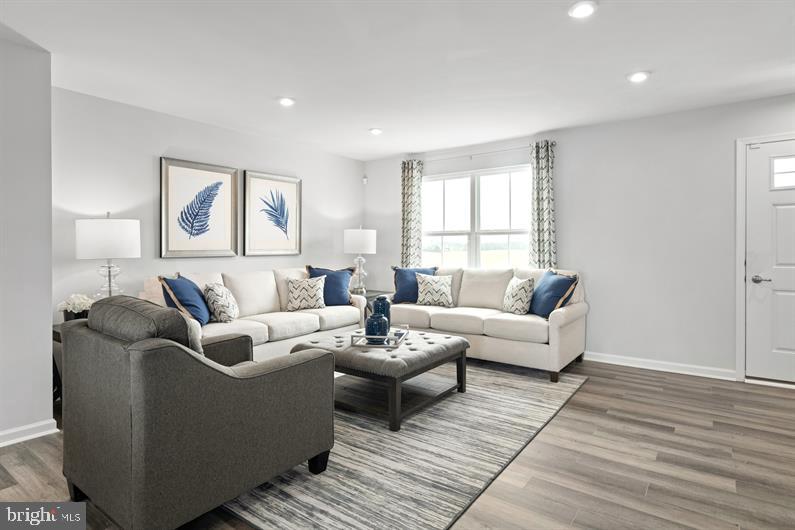 9216 Cooks Point Court, Unit 34 Lanham, MD 20706 - Photo 9 of 17 a living room with furniture and a hard wood floor