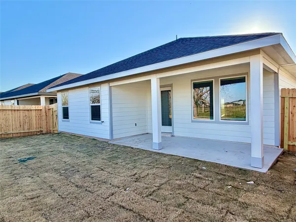a front view of a house with yard