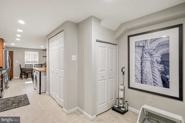 a view of a hallway with workspace