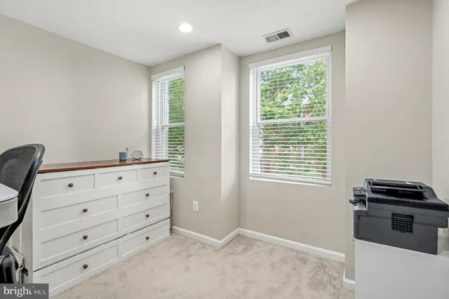 a room with furniture and a window