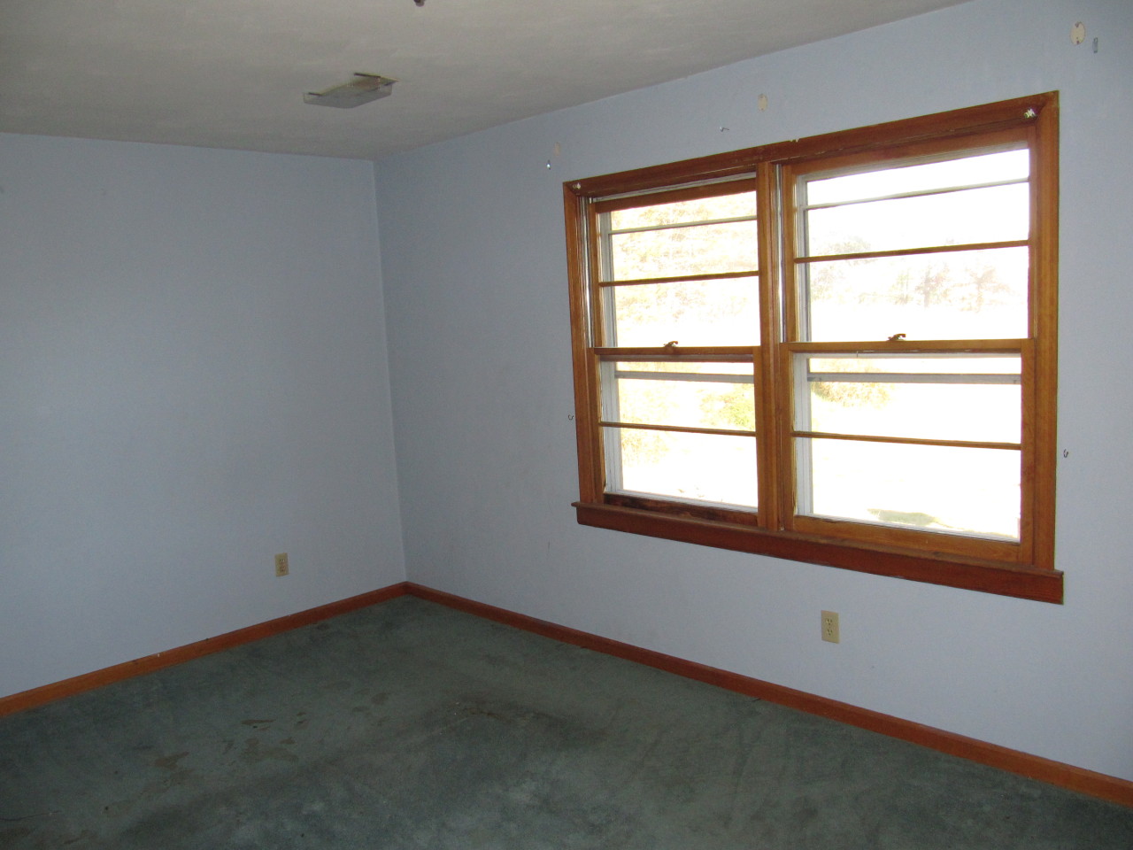 2435 Morgans Mill Road Goodview, VA 24095 - Photo 6 of 6 an empty room with a window