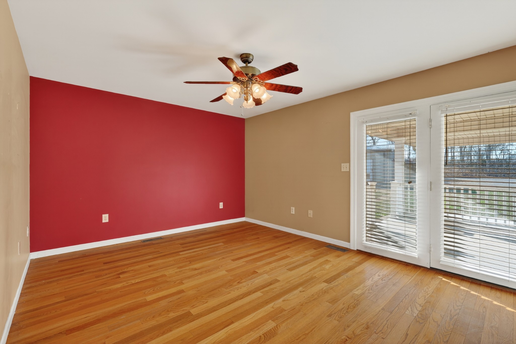 44 Old Camargo Road Fayetteville, TN 37334 - Photo 13 of 38 a view of an empty room with window and wooden floor