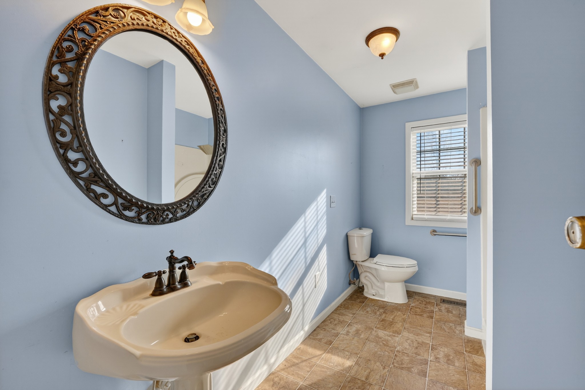 44 Old Camargo Road Fayetteville, TN 37334 - Photo 20 of 38 a bathroom with a sink and a mirror