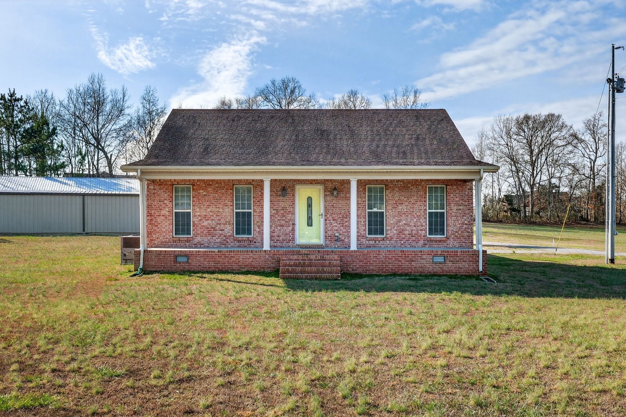 44 Old Camargo Road Fayetteville, TN 37334 - Photo 2 of 38 a front view of a house with garden