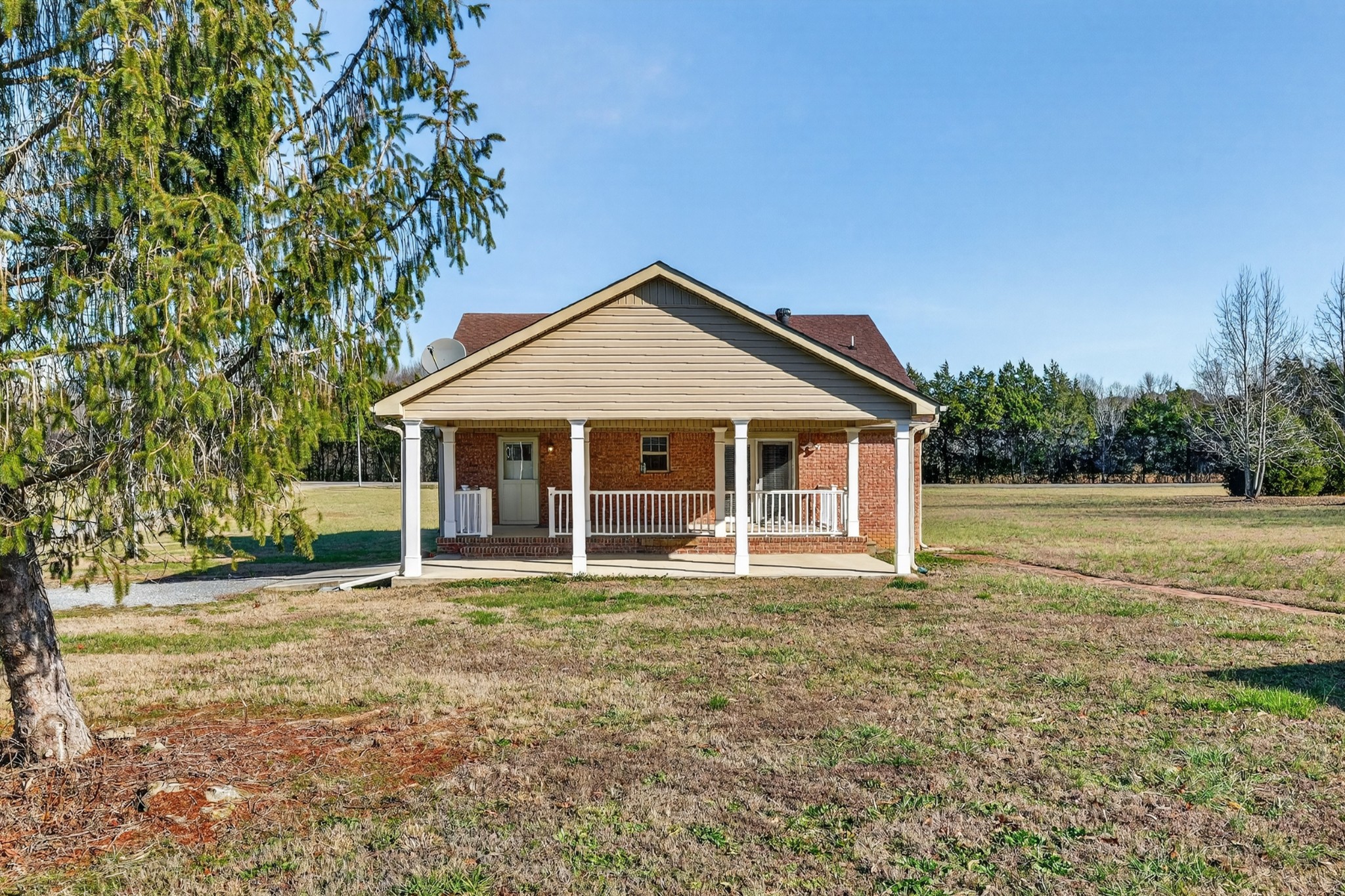 44 Old Camargo Road Fayetteville, TN 37334 - Photo 32 of 38 a front view of a house with a yard