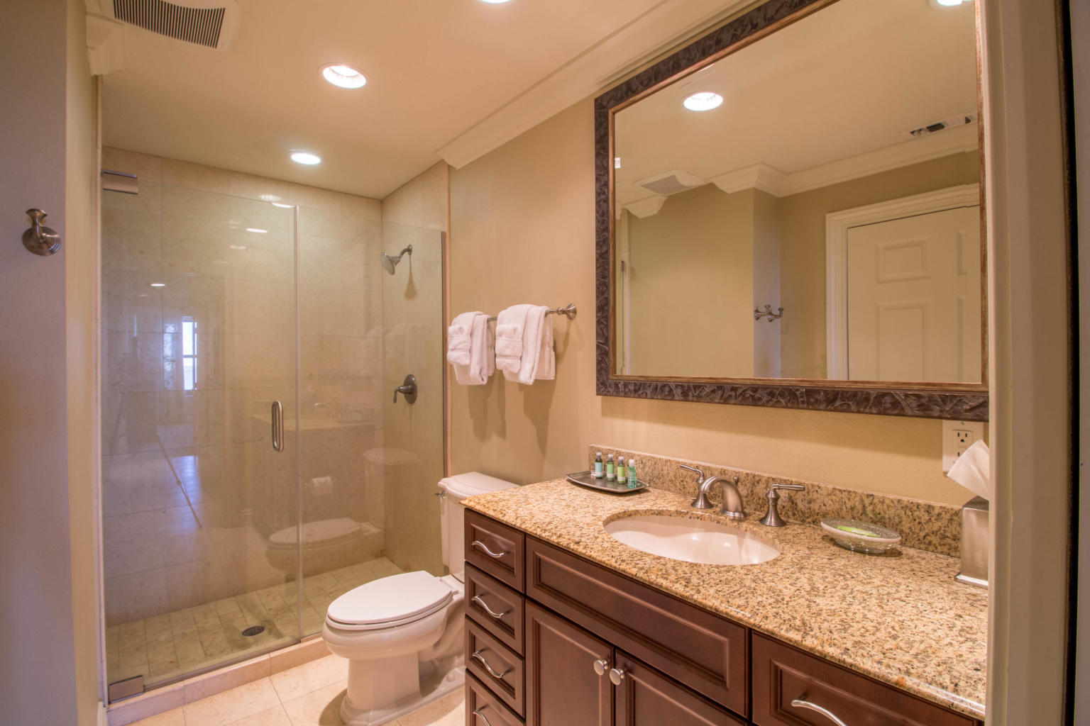 10 Harbor Boulevard, Unit W528 Destin, FL 32541 - Photo 13 of 25 a bathroom with a granite countertop sink toilet and shower