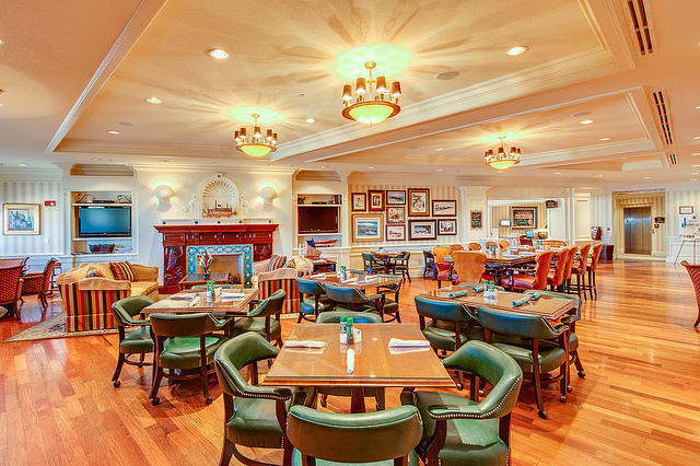10 Harbor Boulevard, Unit W528 Destin, FL 32541 - Photo 16 of 25 a view of a dining room with furniture and wooden floor