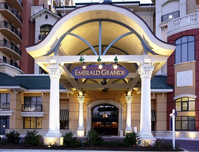 10 Harbor Boulevard, Unit W528 Destin, FL 32541 - Photo 22 of 25 a man standing next to a building