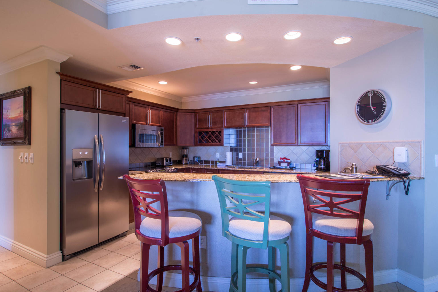 10 Harbor Boulevard, Unit W528 Destin, FL 32541 - Photo 5 of 25 a kitchen with a table and chairs in it