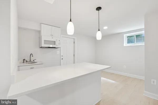 a view of kitchen and windows