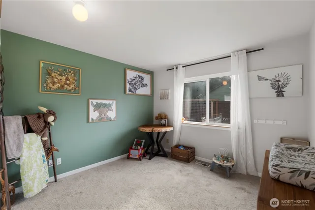 a room with furniture and a window