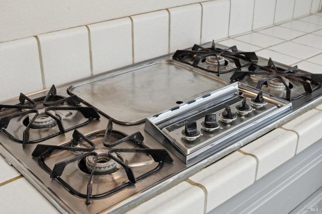 a view of a livingroom with furniture and wooden floor