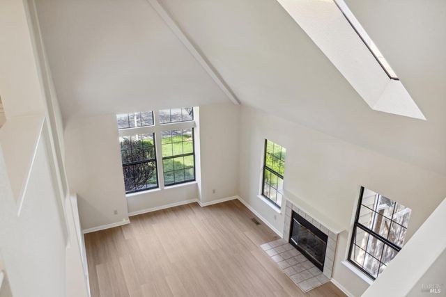 a spacious bathroom with a bathtub and a shower