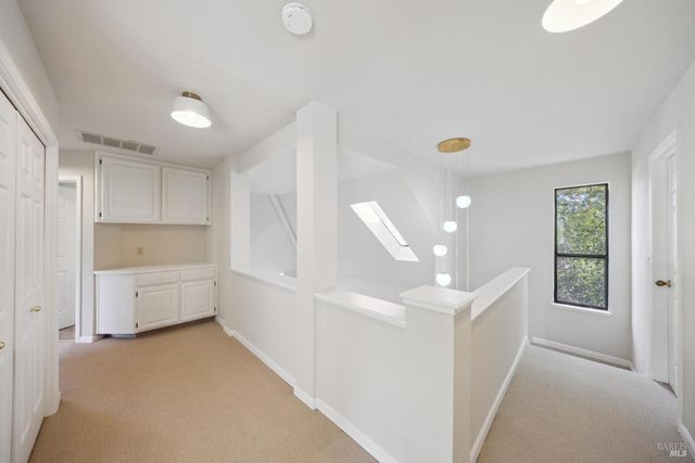 a view of a bath tub sitting in a bathroom