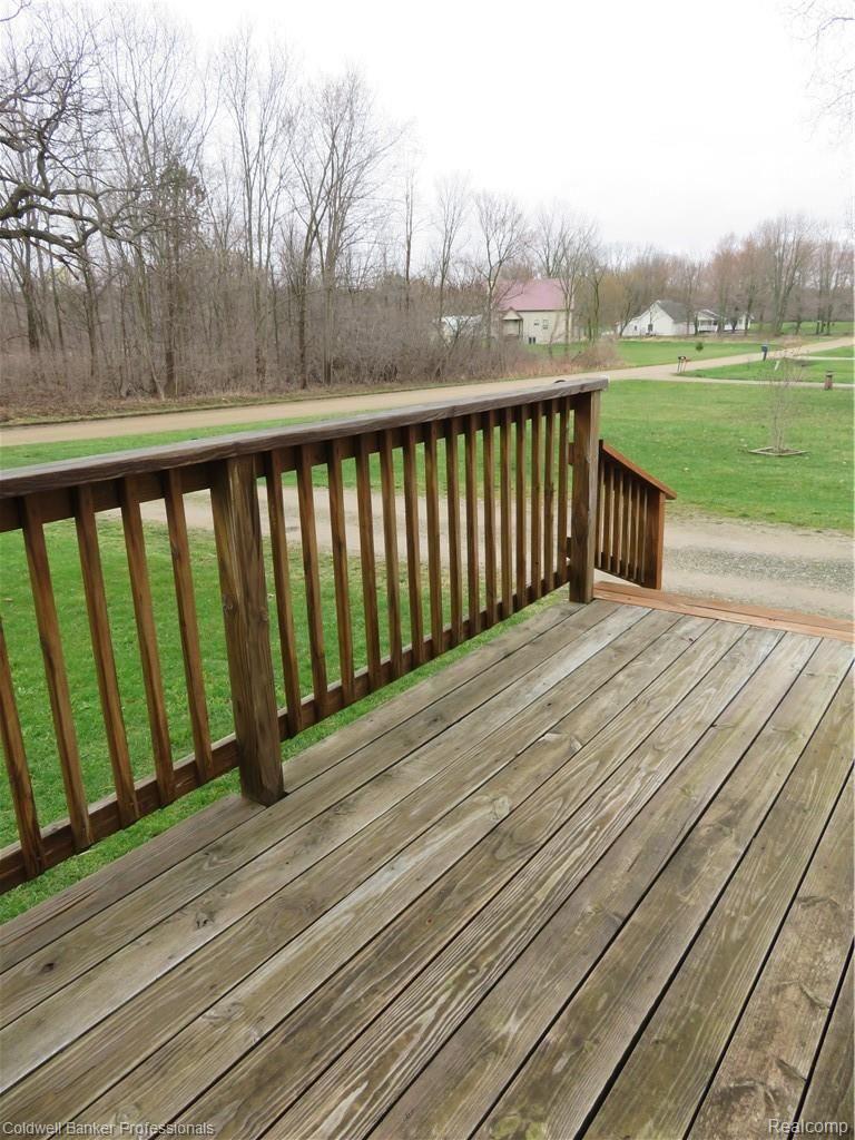 104 East Church Road Morrice, MI 48857 - Photo 14 of 20 14 104 Front deck.JPG