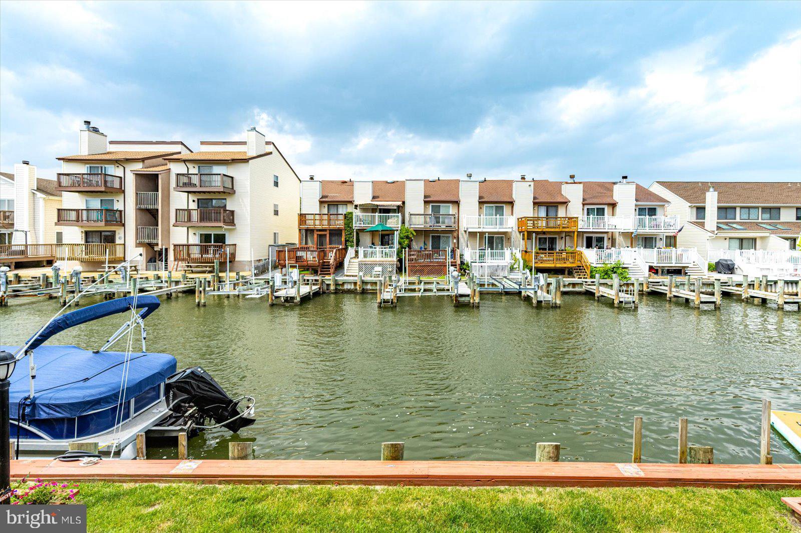 722 Mooring Road, Unit A104 Ocean City, MD 21842 - Photo 28 of 33 a view of a water with tall buildings