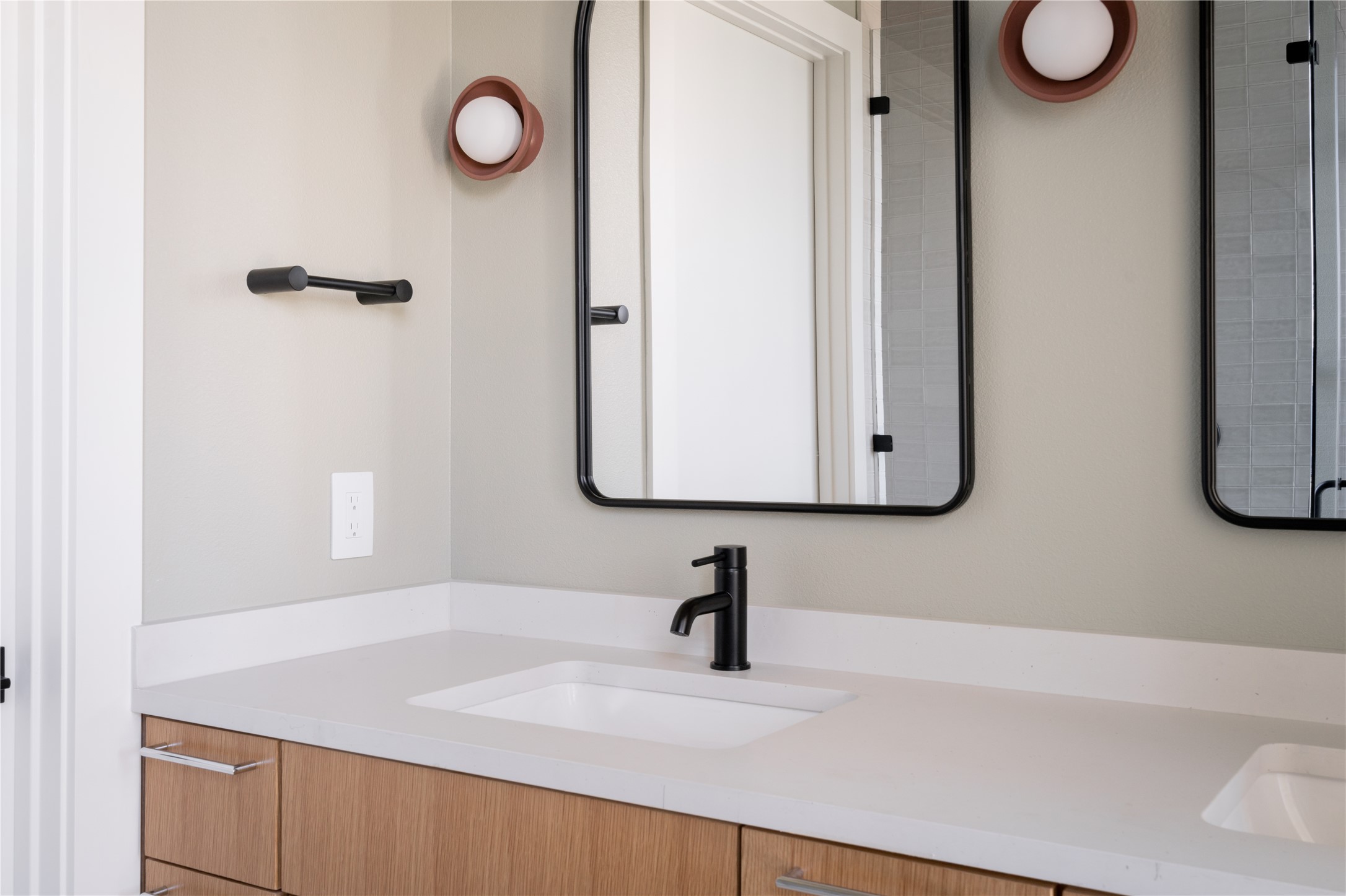 3006 Sorin Street Austin, TX 78723 - Photo 16 of 27 a bathroom with a sink and a mirror
