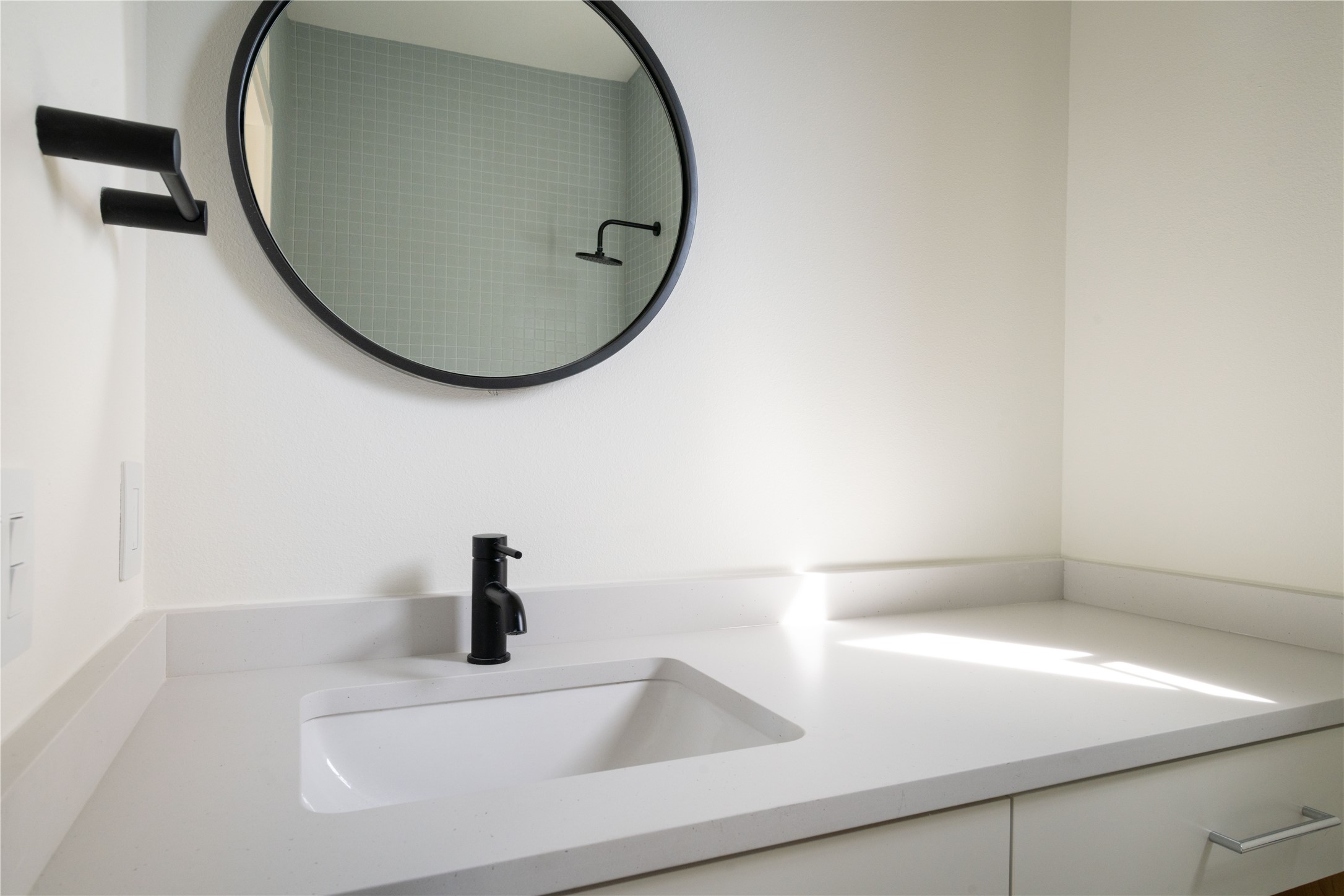 3006 Sorin Street Austin, TX 78723 - Photo 25 of 27 a bathroom with a sink and a mirror