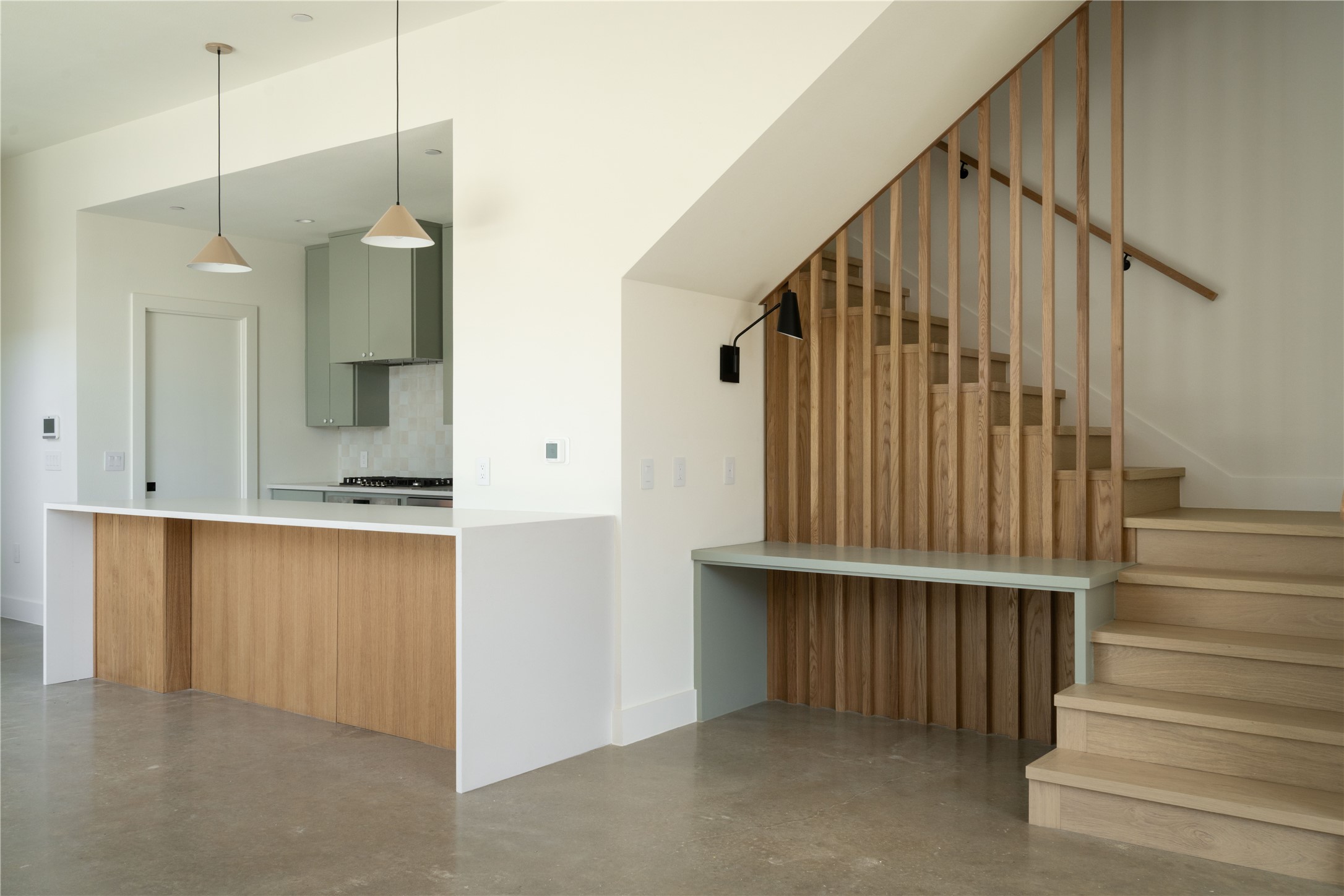 3006 Sorin Street Austin, TX 78723 - Photo 7 of 27 a view of a kitchen with wooden floor and staircase