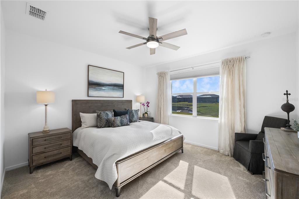 10646 Spring Tide Way Palmetto, FL 34221 - Photo 13 of 35 Primary bedroom