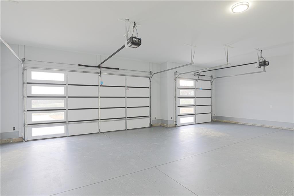 1341 Wheeler Creek Road Maysville, GA 30558 - Photo 21 of 51 a view of a room with racks on the wall