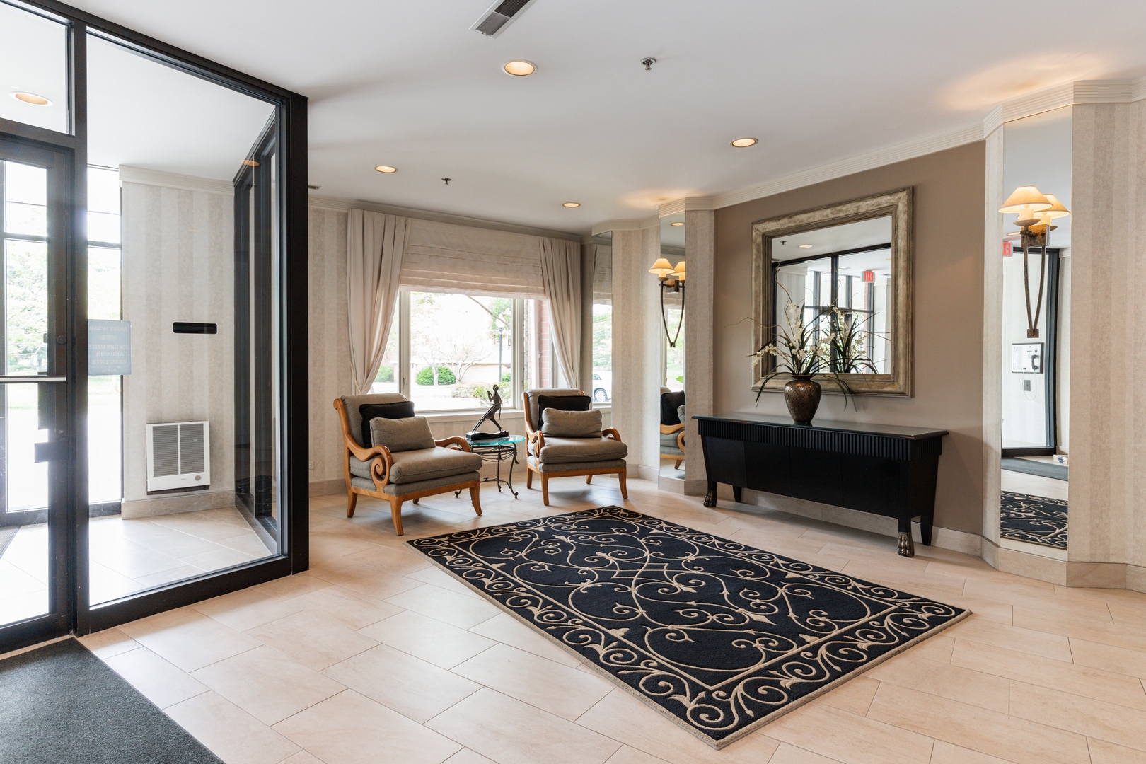 211 Rivershire Lane, Unit 501 Lincolnshire, IL 60069 - Photo 2 of 17 a living room with furniture and a rug