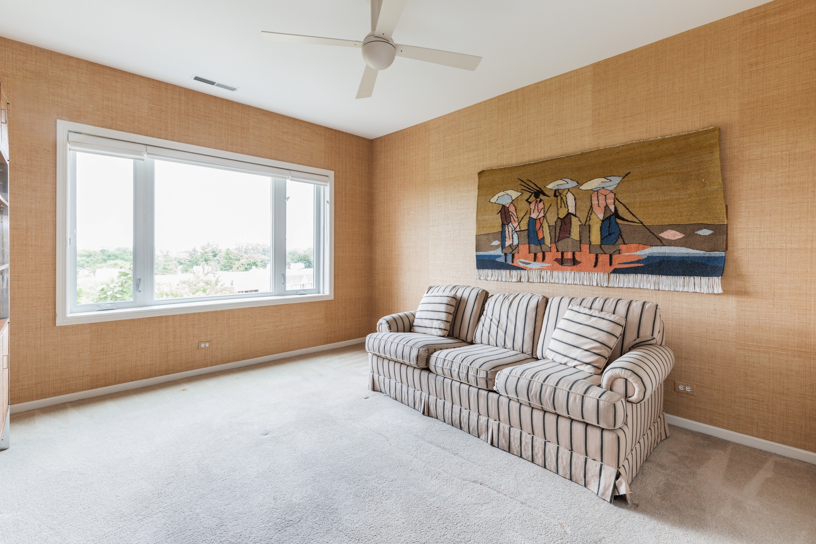 211 Rivershire Lane, Unit 501 Lincolnshire, IL 60069 - Photo 10 of 17 a living room with furniture and a large window