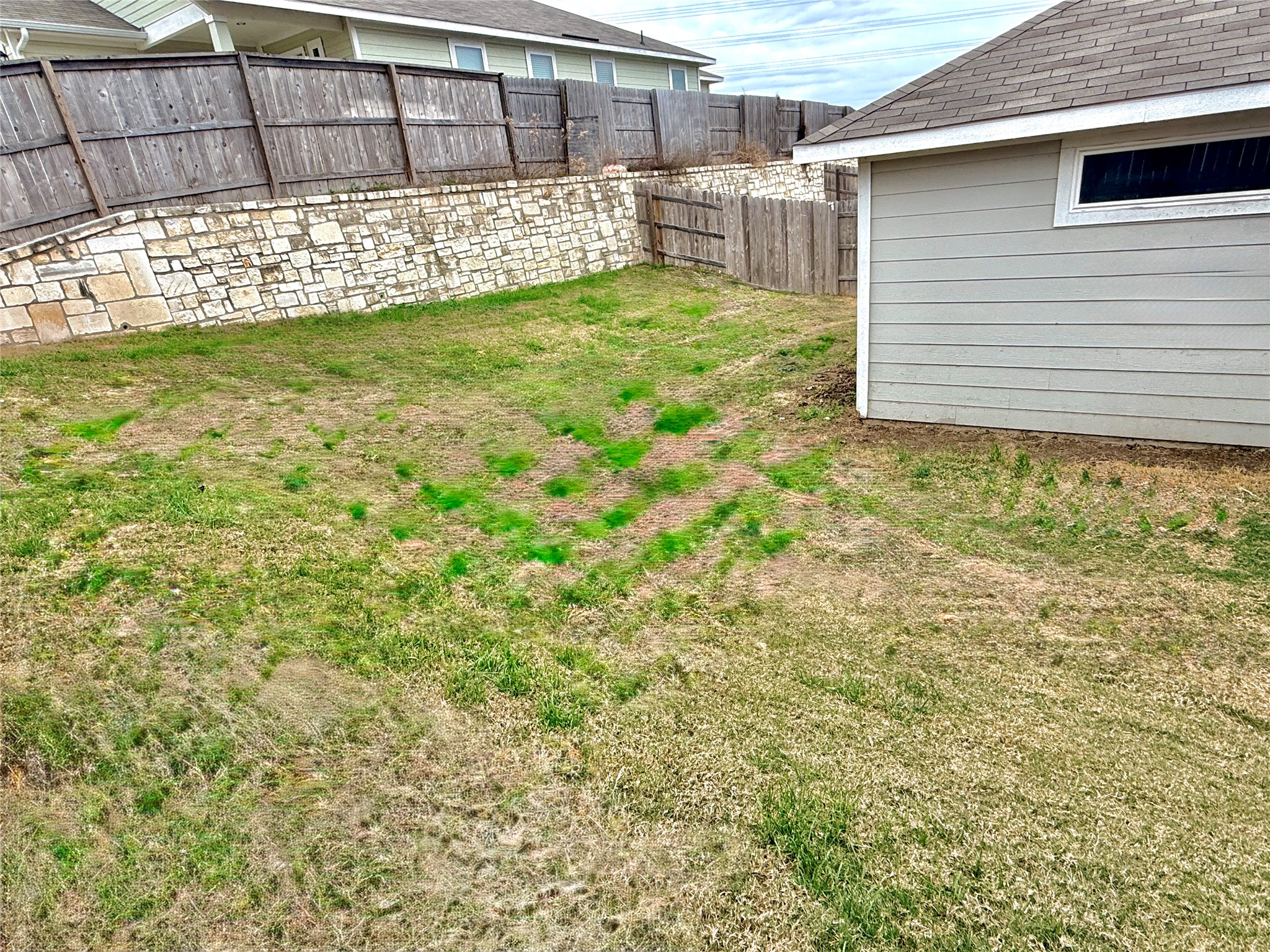 5629 Corso Court Austin, TX 78747 - Photo 12 of 23 View of fenced backyard