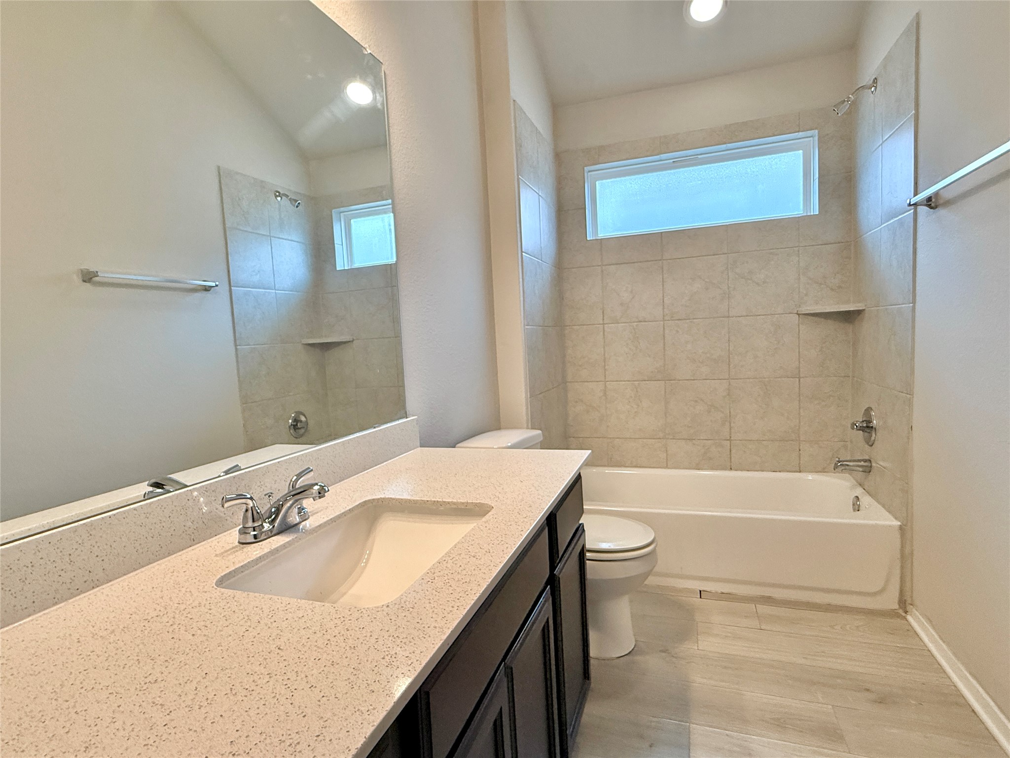5629 Corso Court Austin, TX 78747 - Photo 21 of 23 Full bathroom with bathtub / shower combination and vanity