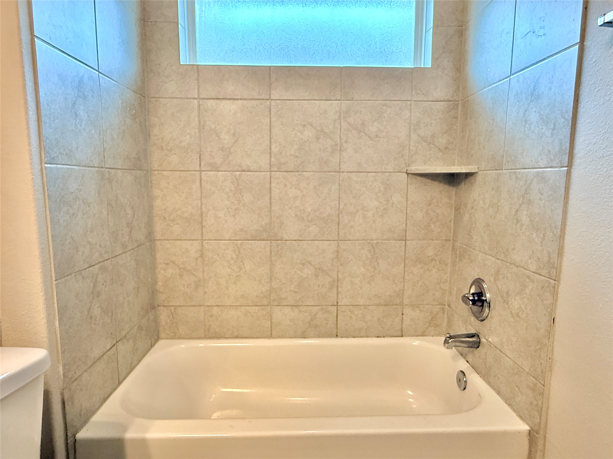 5629 Corso Court Austin, TX 78747 - Photo 23 of 23 Full bathroom with toilet and washtub / shower combination