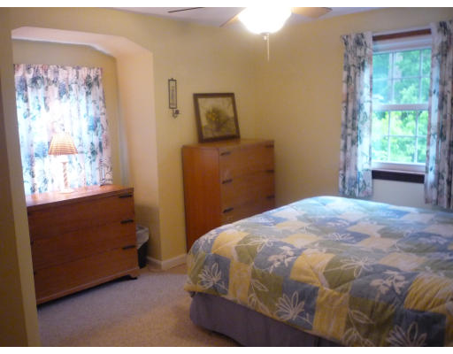 427 Treble Cove Road Billerica, MA 01862 - Photo 13 of 23 a bedroom with a bed and a window