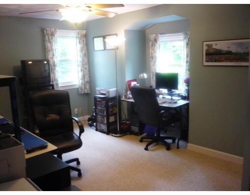 427 Treble Cove Road Billerica, MA 01862 - Photo 17 of 23 a room with furniture and musical instruments