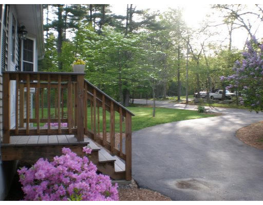 427 Treble Cove Road Billerica, MA 01862 - Photo 21 of 23 a view of a pathway of a house with a yard
