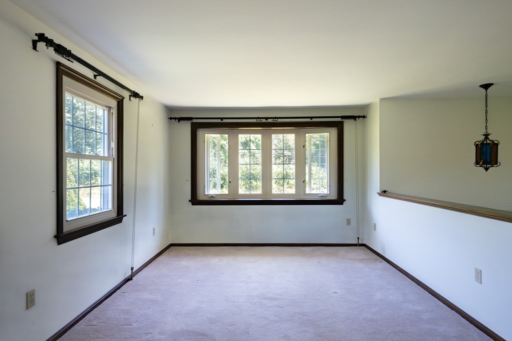 12 Middle Road Southampton, MA 01073 - Photo 8 of 25 a view of an empty room with a window