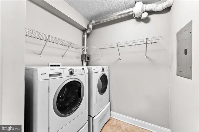 a view of a storage & utility room with racks on the wall