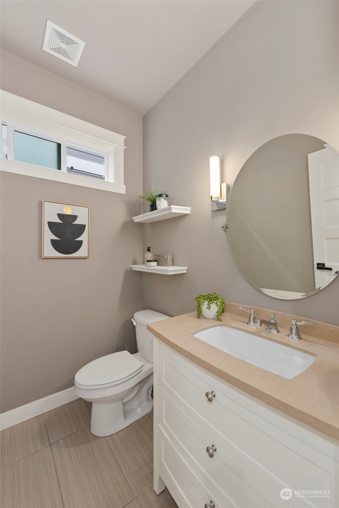 2406 196th Place Southeast Bothell, WA 98012 - Photo 21 of 30 a bathroom with a granite countertop toilet sink and mirror