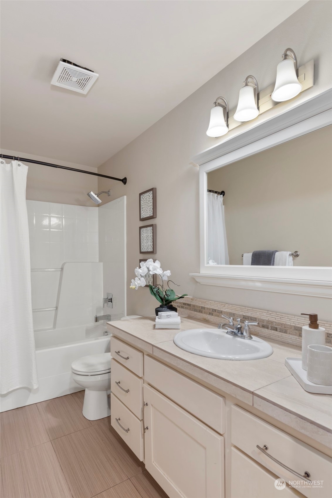 2406 196th Place Southeast Bothell, WA 98012 - Photo 23 of 30 a bathroom with a double vanity sink mirror and toilet