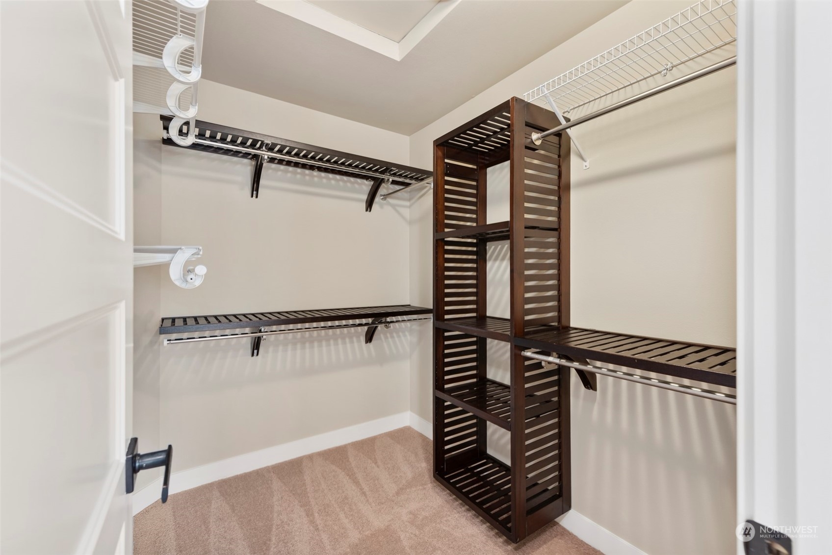 2406 196th Place Southeast Bothell, WA 98012 - Photo 25 of 30 a view of walk in closet with clothes and shoes