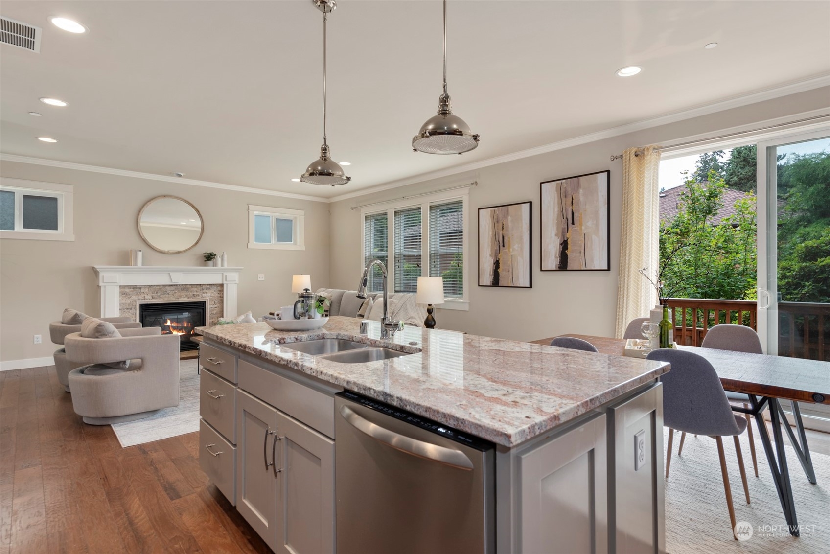 2406 196th Place Southeast Bothell, WA 98012 - Photo 9 of 30 a open kitchen with sink stove and wooden floor