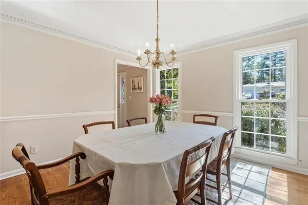 a view of a workspace with a bookshelf