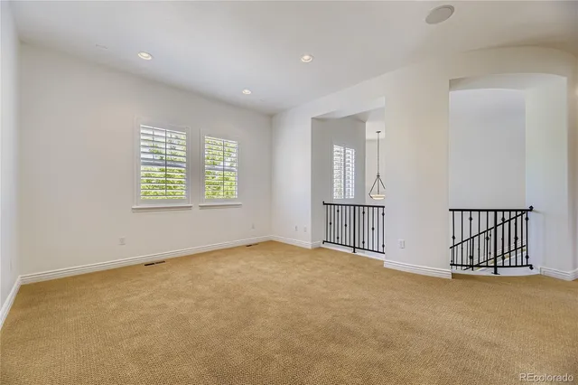 an empty room with windows