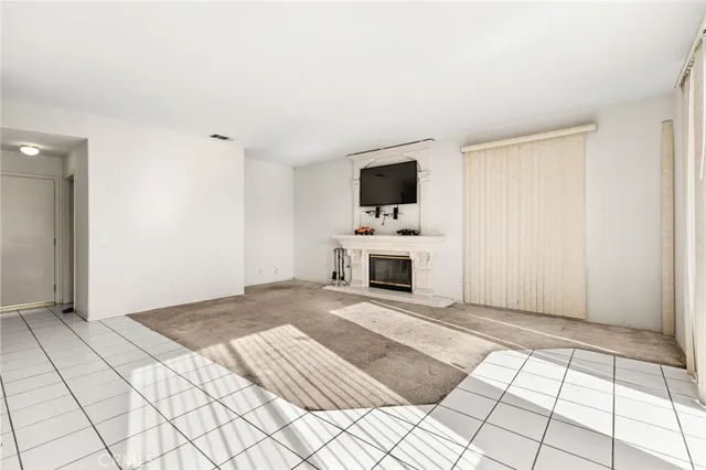 a view of a livingroom with a kitchen