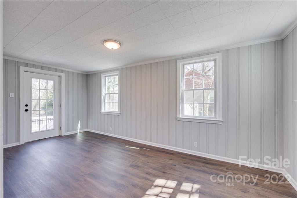 1211 Pinewood Road Rock Hill, SC 29730 - Photo 11 of 19 a view of an empty room with window and wooden floor