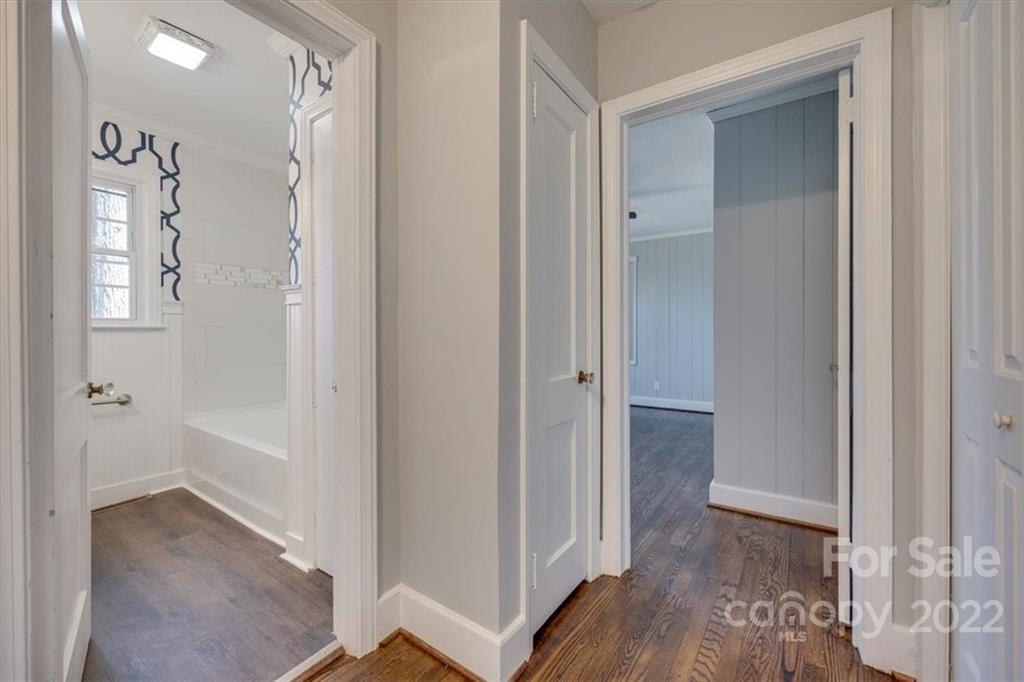 1211 Pinewood Road Rock Hill, SC 29730 - Photo 13 of 19 a view of a hallway with wooden floor and closet