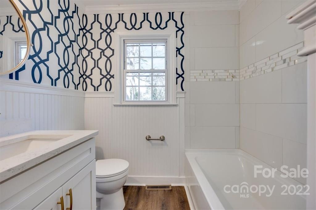 1211 Pinewood Road Rock Hill, SC 29730 - Photo 14 of 19 a bathroom with a bathtub and a toilet